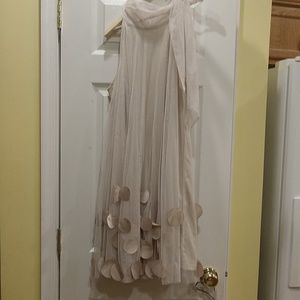 Dress with sheer overlay and circle embellishments